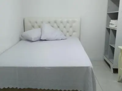 Uma cama ou camas num quarto em Quarto 2 pessoas São Gerardo