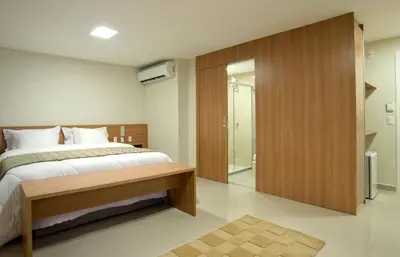 Uma cama ou camas num quarto em Sun Residence