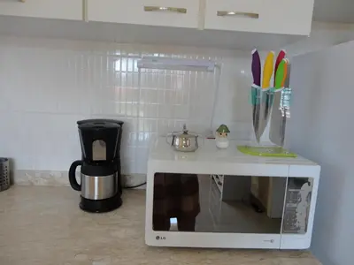 A cozinha ou kitchenette de Chale Canoa Quebrada La Fazenda