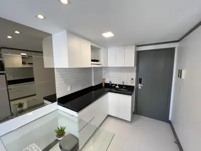 A cozinha ou kitchenette de Particular Blue Tree Towers Beira Mar