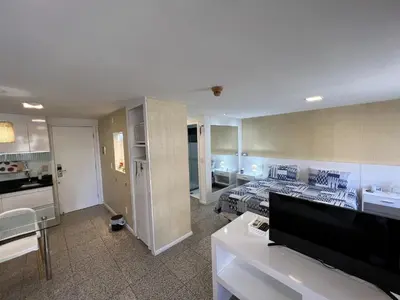 A cozinha ou kitchenette de Particular Blue Tree Towers Beira Mar