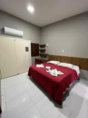 Uma cama ou camas num quarto em São José Village