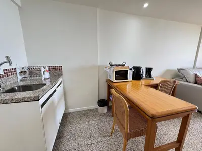 A cozinha ou kitchenette de Flat Blue Tree Beira Mar by Escala