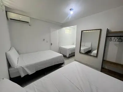 Uma cama ou camas num quarto em Apartamento 2 quartos a 230mts da Praia do Futuro com lazer completo 19