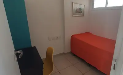 Uma cama ou camas num quarto em Beach Village 707 Norte frente ao mar