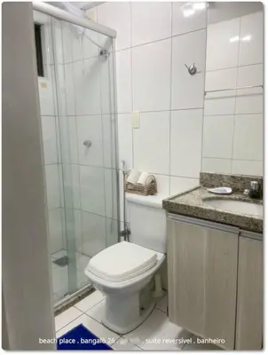 Uma casa de banho em Beach Place Resort . ap térreo