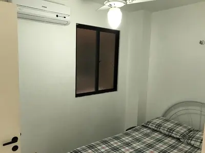 Uma cama ou camas num quarto em Apartamento Meireles