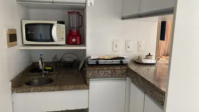 A cozinha ou kitchenette de Flat Frente Mar 4 hospedes401