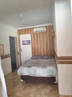 Uma cama ou camas num quarto em Casa Boa Venttura - Guajiru Trairi com ar e piscina