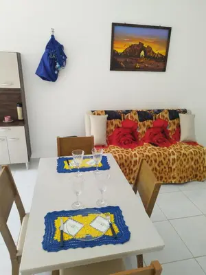 Uma cama ou camas num quarto em Sol Apartamento 4 - Quarto e sala com varanda e cozinha americana na praia do prea-CE