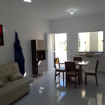 Sol Apartamento 4 - Quarto e sala com varanda e cozinha americana na praia do prea-CE