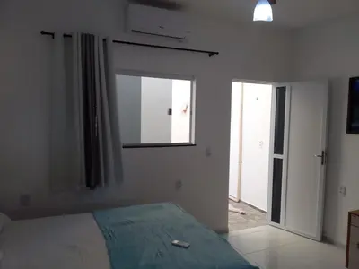 Uma cama ou camas num quarto em Casa do Bruno - Apartamento terreo - 1 - Terra - Quarto e sala com cozinha americana na praia do preá-CE