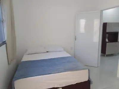 Uma cama ou camas num quarto em Estrela Apartamento 2 terreo - Quarto e sala com cozinha americana na praia do prea-Ce