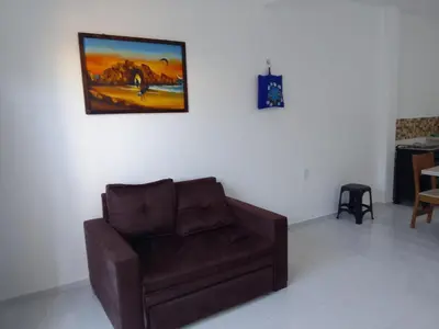 Uma área de estar em Estrela Apartamento 2 terreo - Quarto e sala com cozinha americana na praia do prea-Ce