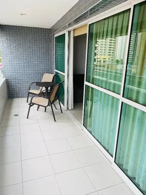 Uma varanda ou terraço em Beach Class Fortaleza by AM