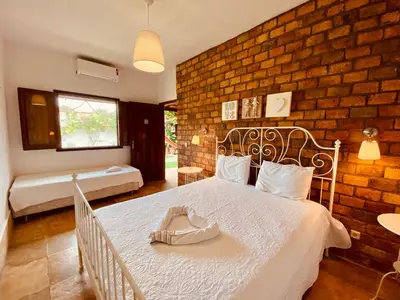 Uma cama ou camas num quarto em Casa Dos Patos