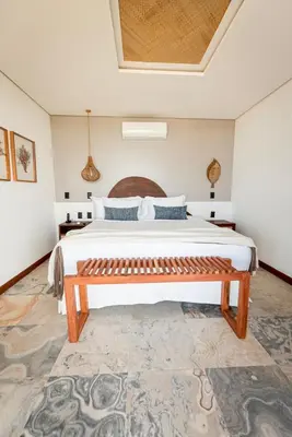 Uma cama ou camas num quarto em Carlore Hotel Taíba