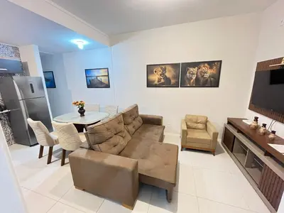 Uma televisão e/ou sistema de entretenimento em Refúgio Tropical: Casa das Praias