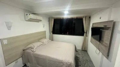 Uma cama ou camas num quarto em Flat New Point