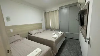 Uma cama ou camas num quarto em Flat New Point