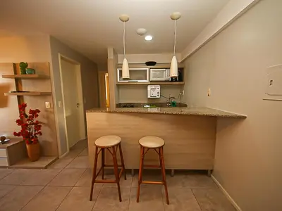 A cozinha ou kitchenette de Flat Hotel Mercure Vista Mar