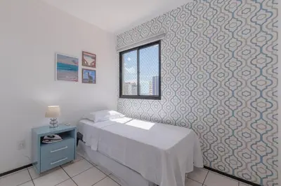 Uma cama ou camas num quarto em Hamilton #1404 - Apto na praia by Carpediem
