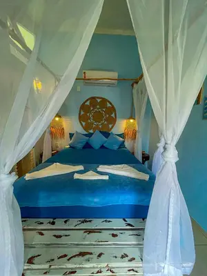 Uma cama ou camas num quarto em ASAS DEL MAR - SUITES