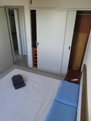 Uma cama ou camas num quarto em Apto privado no Edifício residencial Náutico 5 ºandar