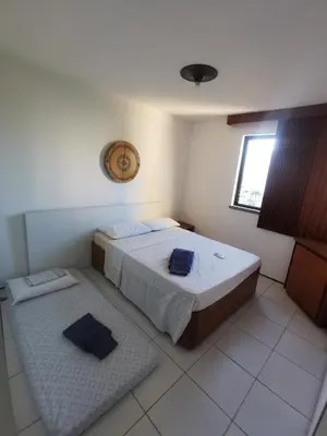 Uma cama ou camas num quarto em Apto privado no Edifício residencial Náutico 5 ºandar
