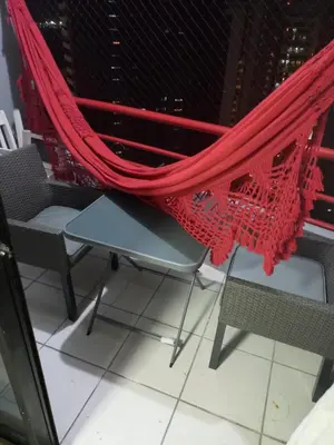 Uma área de estar em Apartamento com toda mobília nova de frente para o mar praia de iracema