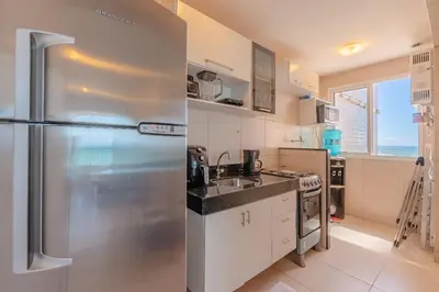 A cozinha ou kitchenette de Beach Village #1503 - Apê na Praia por Carpediem