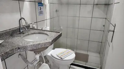 Uma casa de banho em Familia VIP 4 Pessoas Praia de Iracema