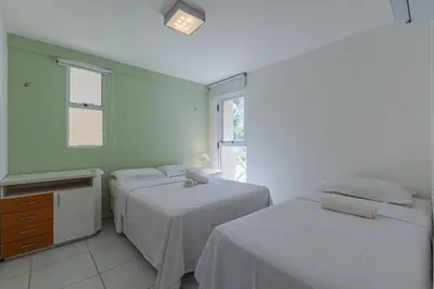 Uma cama ou camas num quarto em Portamaris Resort - Apartamento luxo by Carpediem