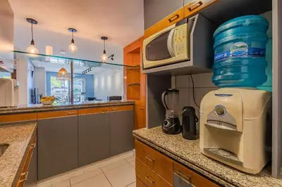 A cozinha ou kitchenette de Portamaris Resort - Apartamento luxo by Carpediem