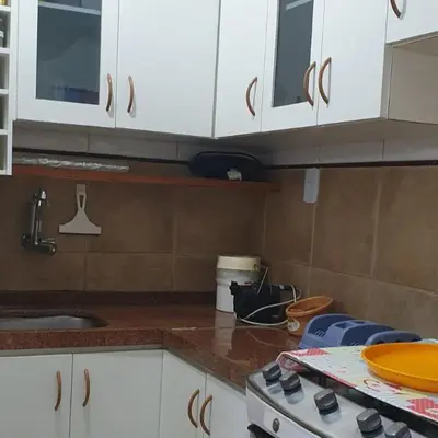 A cozinha ou kitchenette de Confortável apartamento a 100 m Beira Mar - Edifício Zen Residence