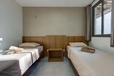 Uma cama ou camas num quarto em Wai Wai #202C - Apê em Cumbuco por Carpediem