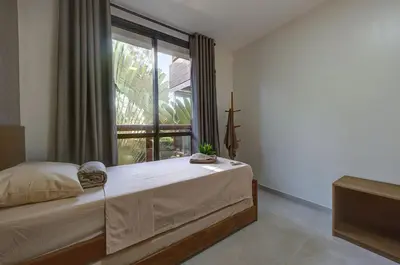 Uma cama ou camas num quarto em Wai Wai #202C - Apê em Cumbuco por Carpediem