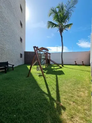 Um jardim no exterior de Apt pé na areia ao lado do Beach Park no Porto das Dunas