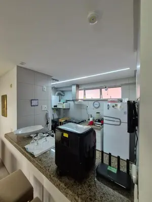 A cozinha ou kitchenette de Apt pé na areia ao lado do Beach Park no Porto das Dunas