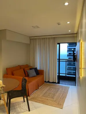 Uma área de estar em Lindo apartamento na Beira Mar Edifício Landscape