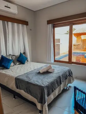 Uma cama ou camas num quarto em Chill House Praia do Preá-CE