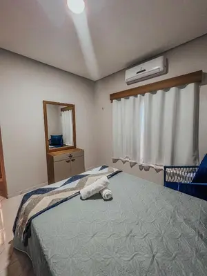 Uma cama ou camas num quarto em Chill House Praia do Preá-CE
