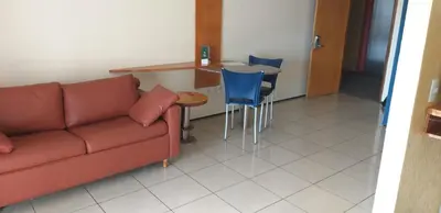 Uma área de estar em ApartHotel - Praia Mansa 1 e 2 Qtos