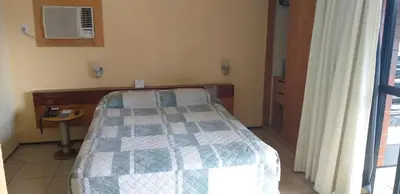 Uma cama ou camas num quarto em ApartHotel - Praia Mansa 1 e 2 Qtos