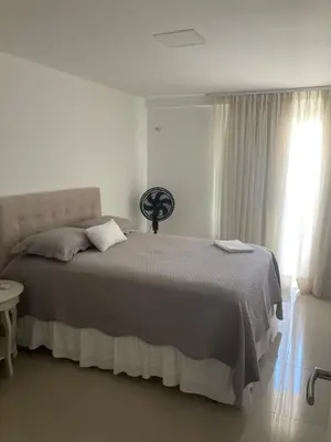 Uma cama ou camas num quarto em Apto Praia Porto das Dunas-Aquiraz