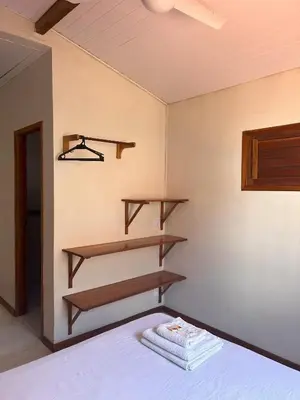 Uma cama ou camas num quarto em Pousada Meu Lugar