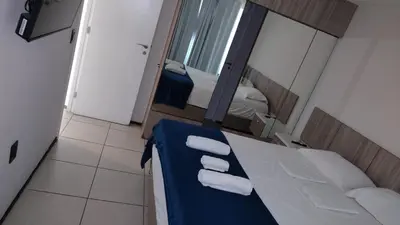 Uma cama ou camas num quarto em Terraços do Atlântico - Apto Beira Mar Fortaleza
