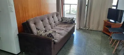 Uma área de estar em Flat à100m da Avenida Beira Mar