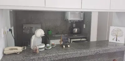 A cozinha ou kitchenette de Flat à100m da Avenida Beira Mar
