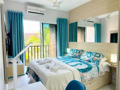 Uma cama ou camas num quarto em Beach Living - pé na areia, 200m do Beach Park